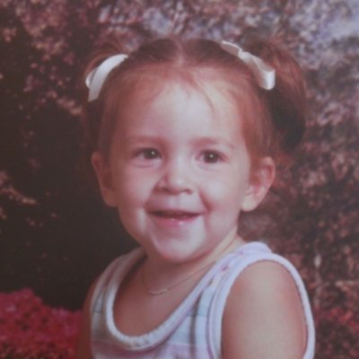 Childhood photo of BrandFuel employee Aarica Burkholder.