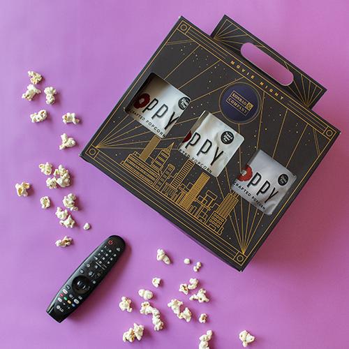 A gift box with different types of popcorn.